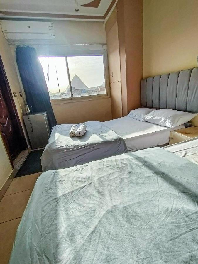 Happy Days Pyramids Inn Kafret el-Gabal المظهر الخارجي الصورة